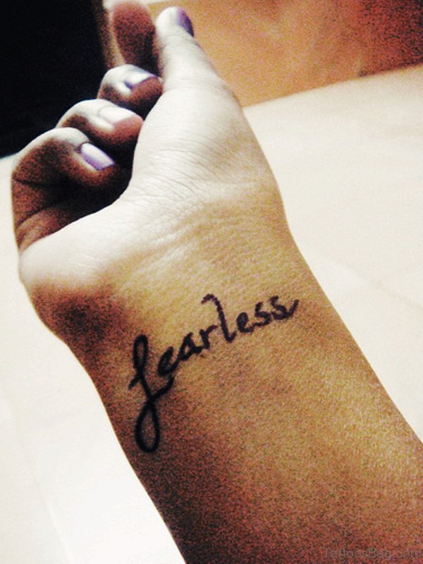 Simple Fearless Tattoo On Wrist 
