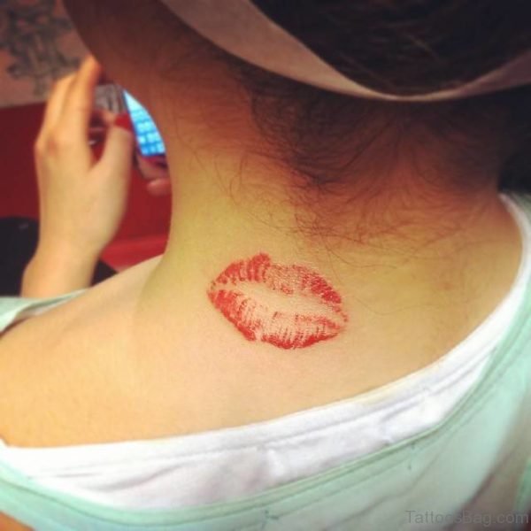 Simple Kiss Mark Tattoo On Neck