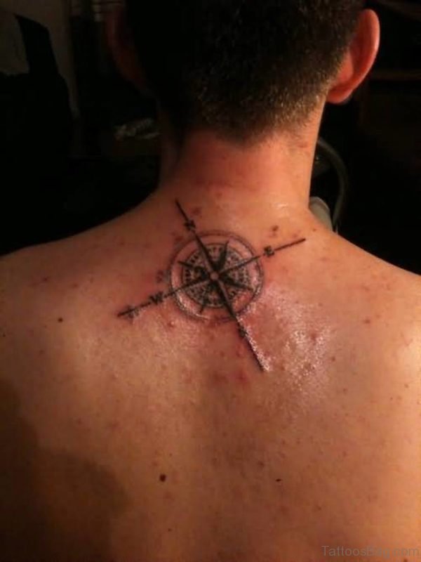 Simple Small Compass Tattoo On Upper Back