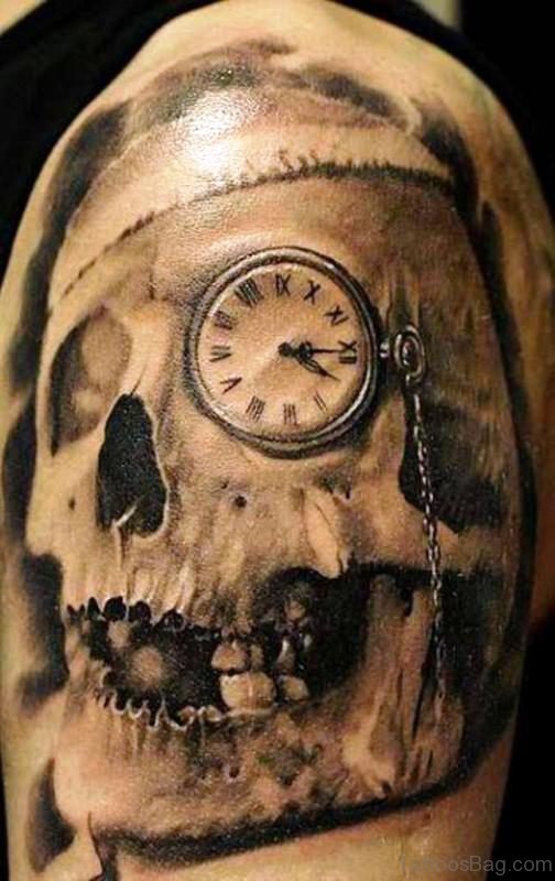 Skull And Clock Tattoo On Left Shoulder