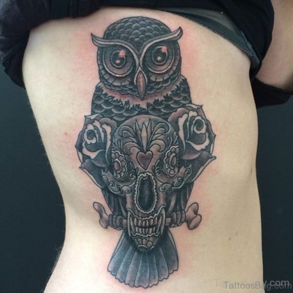 Skull And Owl Tattoo On Rib