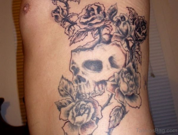 Skull And Roses Tattoo On Rib