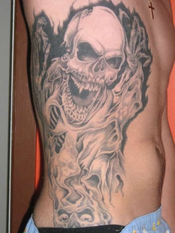 Skull And Tribal Tattoo