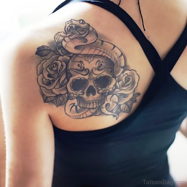 Skull With Flower And Snake Tattoo 
