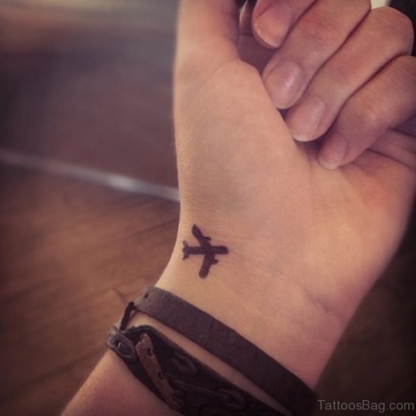Small Aeroplane Wrist Tattoo