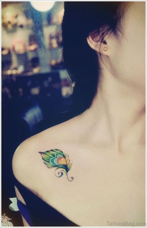 Small Feather Tattoo On Chest