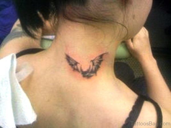Small Flying bat Neck Tattoo