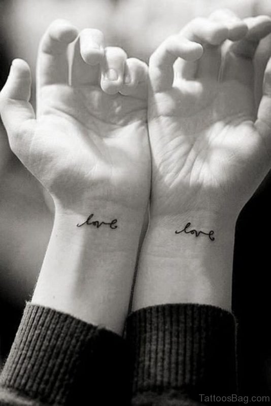 Small Love Word Tattoo On Wrist