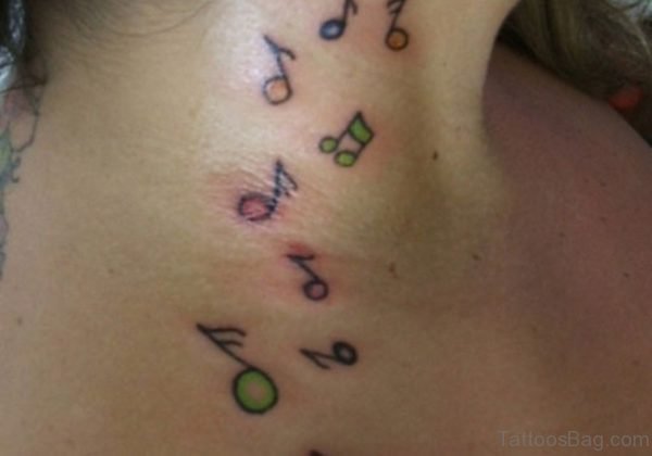 Small Musical Note Tattoo On Neck