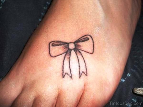 Small Ribbon Tatto On Foot