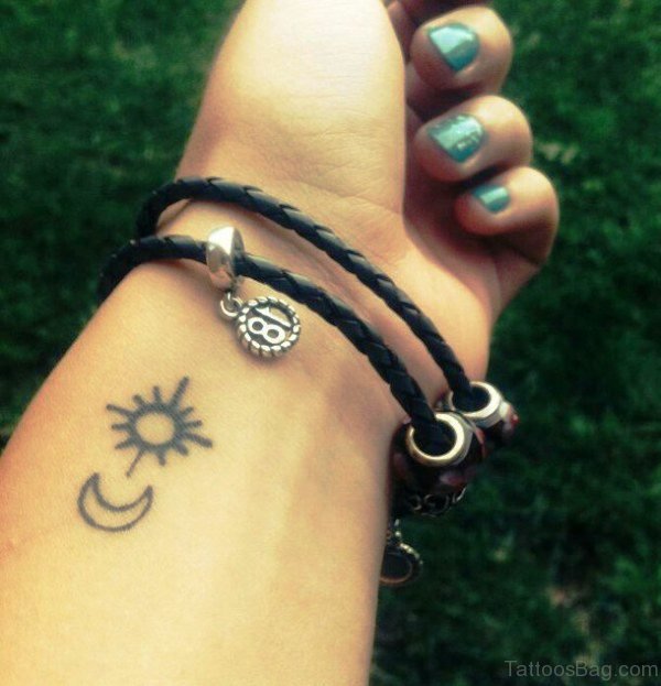 Small Wrist Sun Tattoo