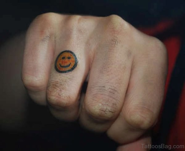Smile Tattoo On Ring Finger