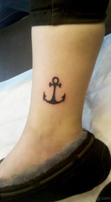 Stunning Black Ink Anchor Tattoo On Ankle
