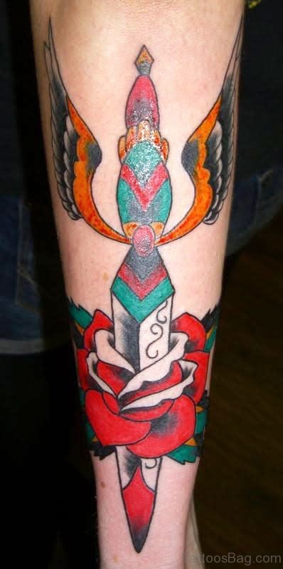 Stunning Dagger Tattoo On Arm