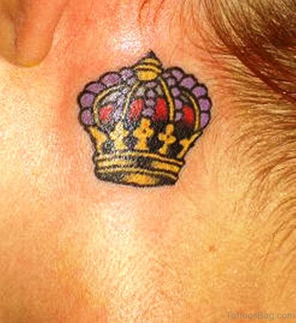 Stunning Small Crown Tattoo On Neck