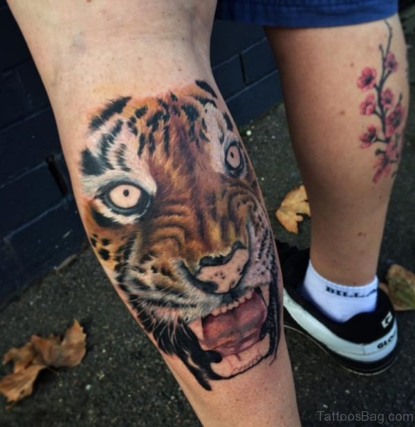Stunning Tiger Face Tattoo On Leg