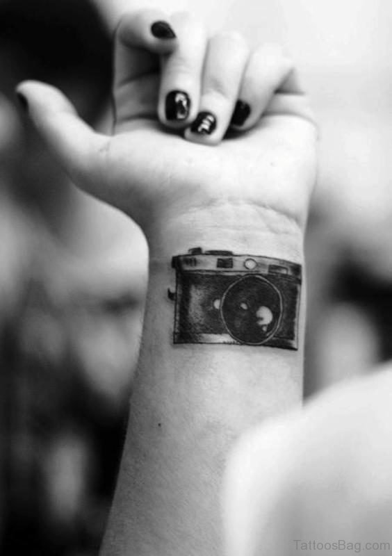 Stylish Black Camera Tattoo On Wrist 