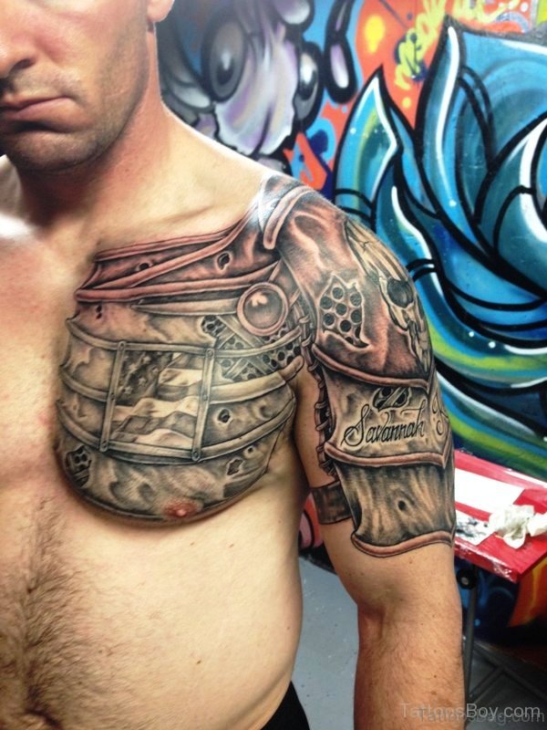 Stylish Chest And Shoulder Armour Tattoo