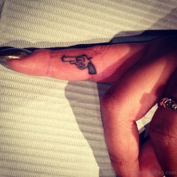 Stylish Gun Tattoo On Finger