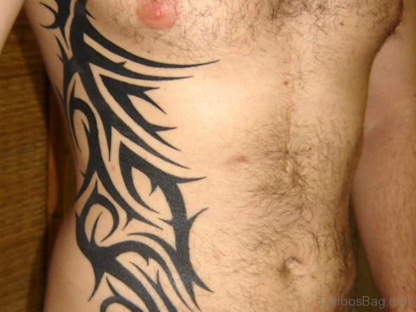 Stylish Tribal Tattoo On Rib