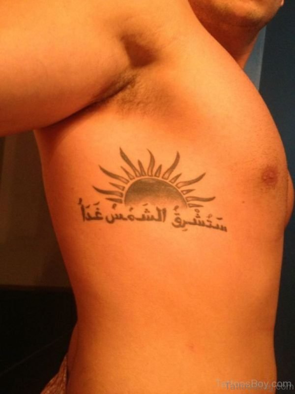 Sun And Word Tattoo On Rib