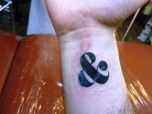 Sweet Ampersand Tattoo On Wrist 