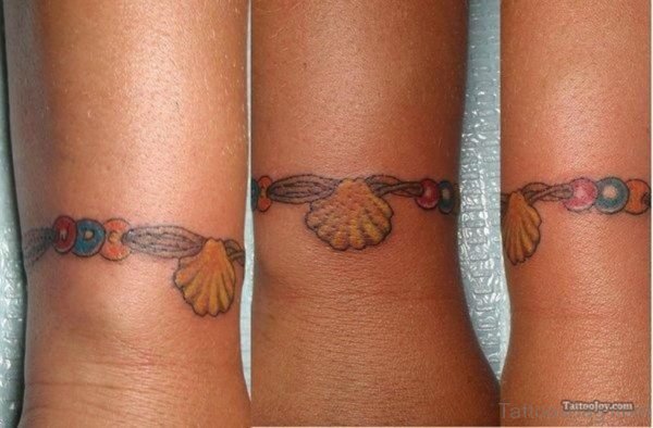 Sweet Seashell Tattoo On Wrist