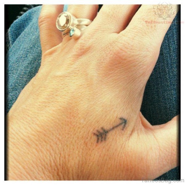 Tiny Arrow Tattoo On Hand 