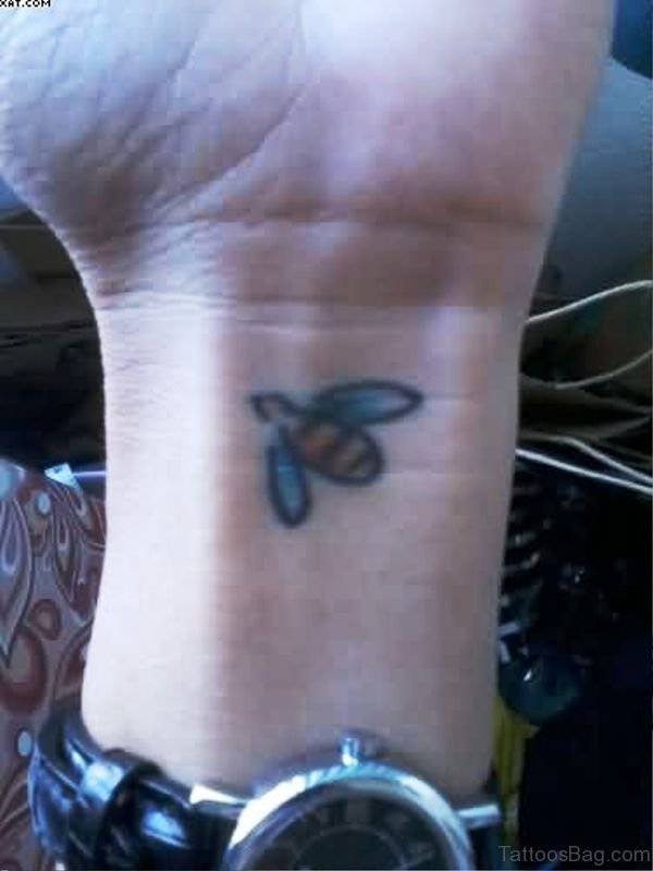 Tiny Bee Tattoo On Wrist 