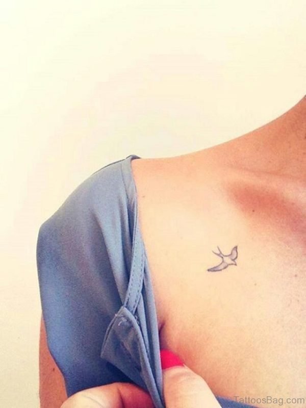 Tiny Bird Tattoo on Chest 