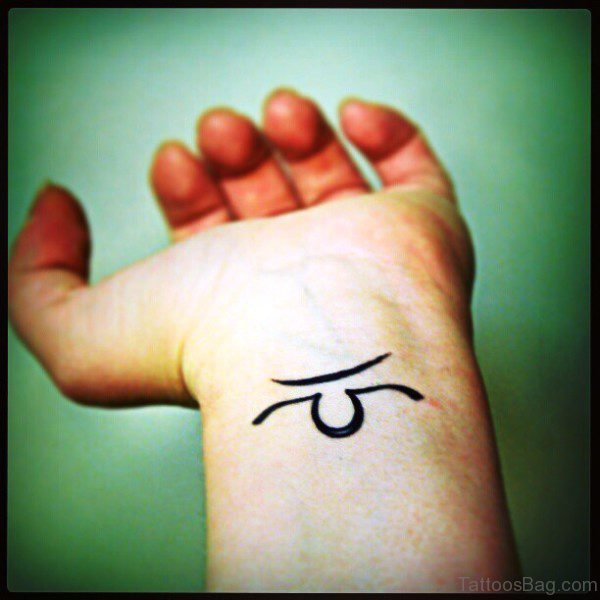 Tiny Black Libra Wrist Tattoo
