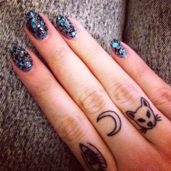 Tiny Moon Tattoo On Finger 