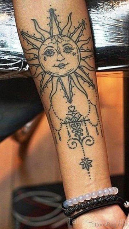Traditional Sun Tattoo On Wrist 