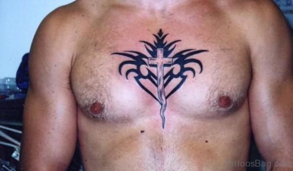 Tribal And Cross Tattoo On Man Chest