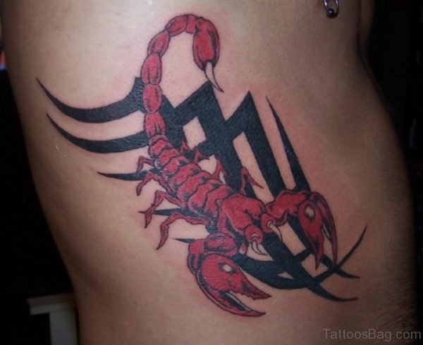 Tribal And Red Scorpio Tattoo On Side Rib