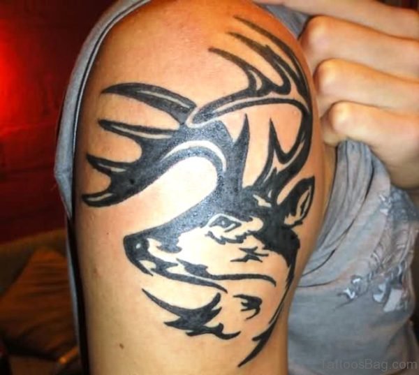 Tribal Buck Tattoo On Shoulder