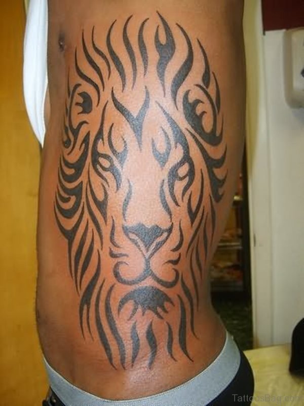 Tribal Lion Face Tattoo On Rib