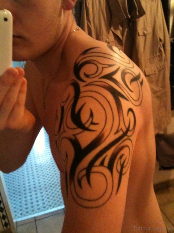Tribal Tattoo On Left Shoulder 