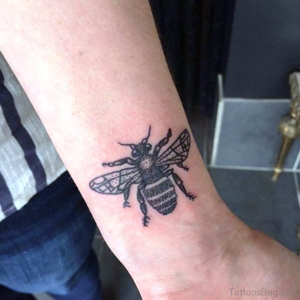 Unique Black Bee Tattoo On Wrist 
