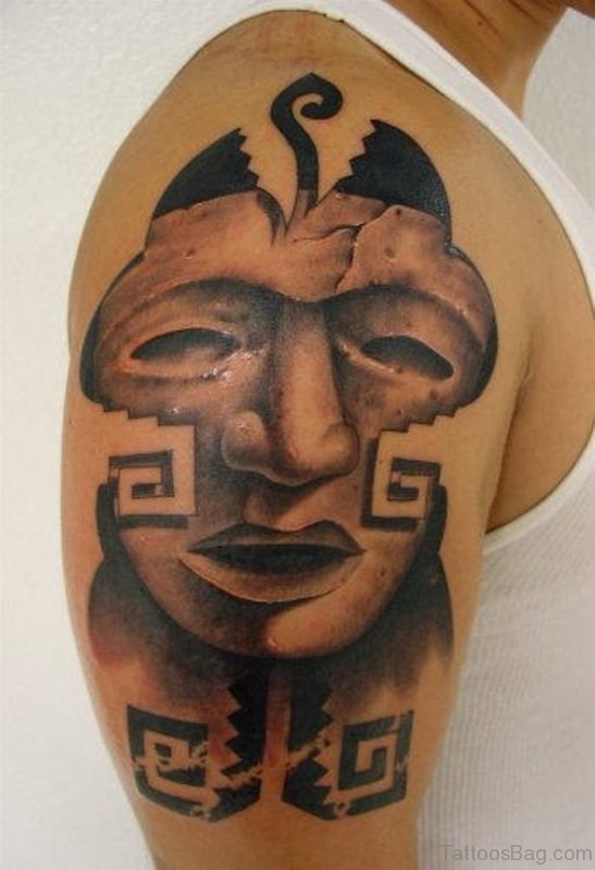 Unique Mask Tattoo On Shoulder
