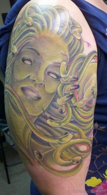 Weird Medusa Tattoo On Shoulder