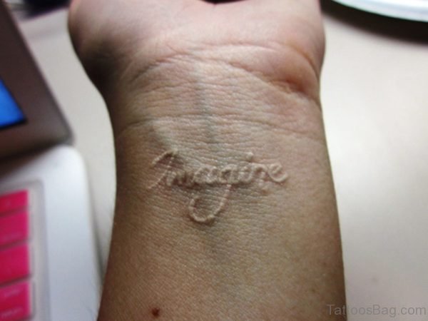 White Imagine Wrist Tattoo 