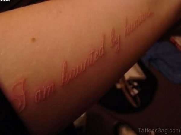 White Ink Words Tattoo On Arm