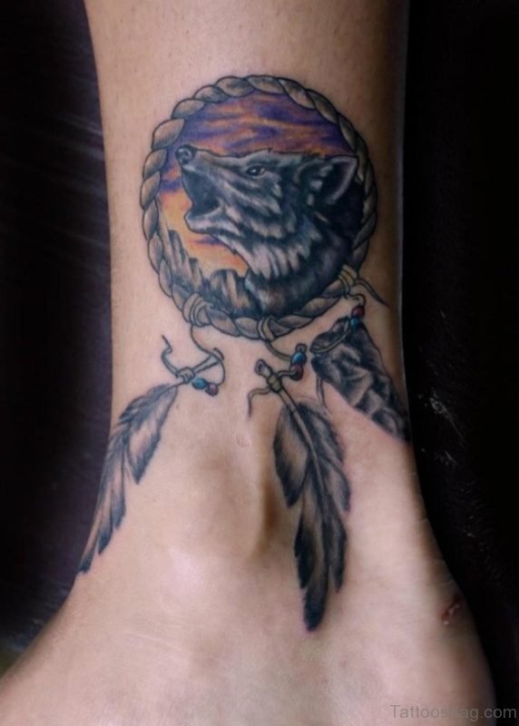 Wolf And Dreamcatcher Tattoo On Ankle