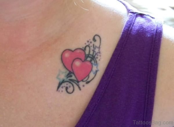 Women Chest Small Red Heart Tattoo Design