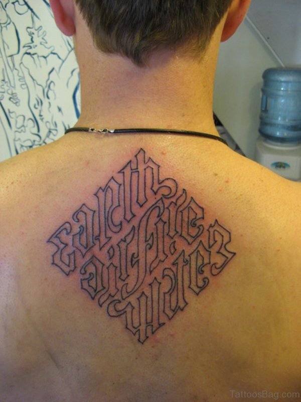 Wonderful Ambigram Tattoo On Upper Back