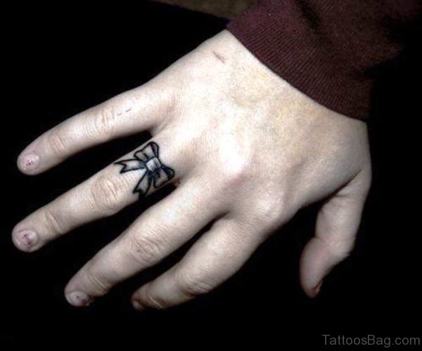 Wonderful Bow Tattoo On Ring Finger