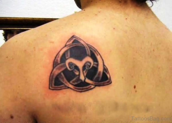 Wonderful Celtic Knot And Aries Symbol Tattoo On Upper Back