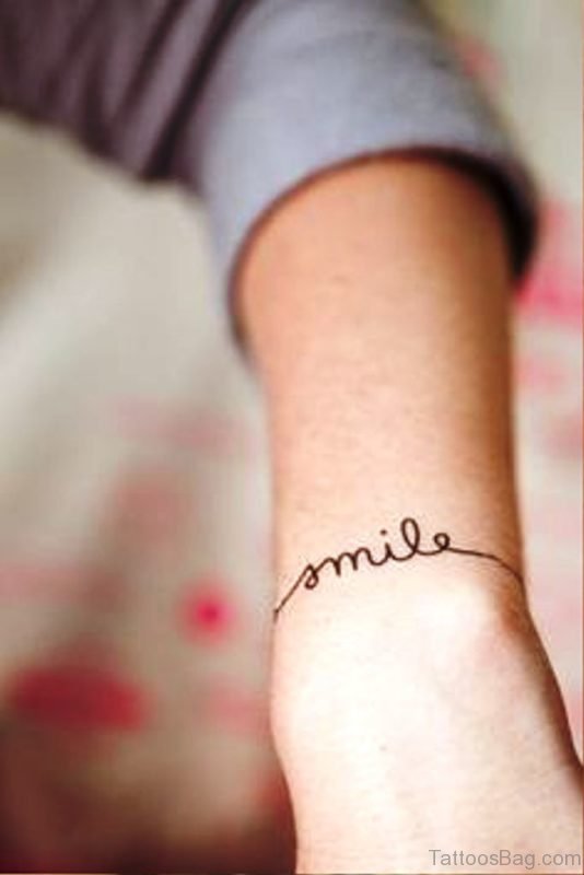 Wonderful Smile Tattoo On Wrist