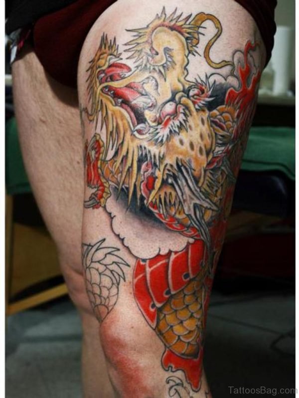 Yellow Dragon Tattoo On Thigh